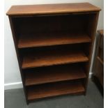 An oak bookshelf of four shelves, 77x29x113cmH