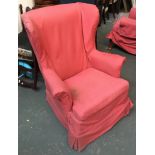 A pair of wingback armchairs, each with loose cover and cushion, on cabriole front legs