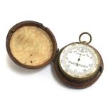 A gilt brass pocket barometer by Thomas Armstrong & Brother, Manchester & Liverpool, approx. 5cmD in