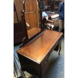 A 20th century mahogany Georgian style dressing table, adjustable mirror, kneehole with single