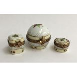 A set of three Limoges peint main pill and trinket boxes, with floral ladybird design
