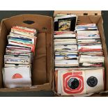 Two boxes of 7" singles to include Kate Bush, Dusty Springfield, John Lennon, Status Quo, Elton