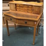 A 20th century maple veneer dressing table, superstructure with various drawers and cupboards,