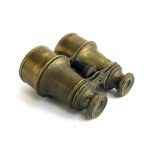 A pair of antique brass binoculars