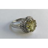 9ct white gold ring set with a lemon citrine, gross weight 6.2g, size N