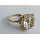 9ct gold ring set with a large white stone, gross weight 6g, size N.5