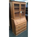 A modern pine bookcase bureau, glazed doors, 96x43x185cmH