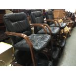 A set of six 1980s leather upholstered cantilevered boardroom chairs