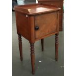 An early 19th century mahogany night stand, galleried top with single drawer, tapering turned