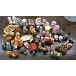 A collection of novelty cruet sets