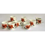 A Susie Cooper for Wedgwood part tea set 'Corn Poppy' design, comprising 5 teacups and saucers, 6