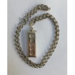 Silver ingot pendant on a silver round link chain, gross weight 45g