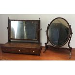A Georgian mahogany dressing mirror, on reeded supports over three drawers, approx. 50cmH;