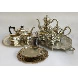 A mixed lot of plated items, to include a three piece plated Georgian style tea set, and a four