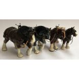 Four ceramic shire horses