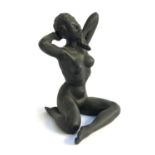 A Gilbert Carradine black bisque nude female figure, signed to base, c.1950, 27cmH