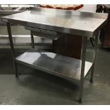 A stainless steel industrial catering unit, with undershelf, made by Sissons, 120x60x91cmH