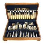 An oak cased canteen by William Page of Sheffield, containing Old English pattern flatware