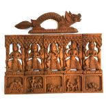 Carved Indian panels depicting gods above erotic scenes, each panel 23x7.5, together with a carved