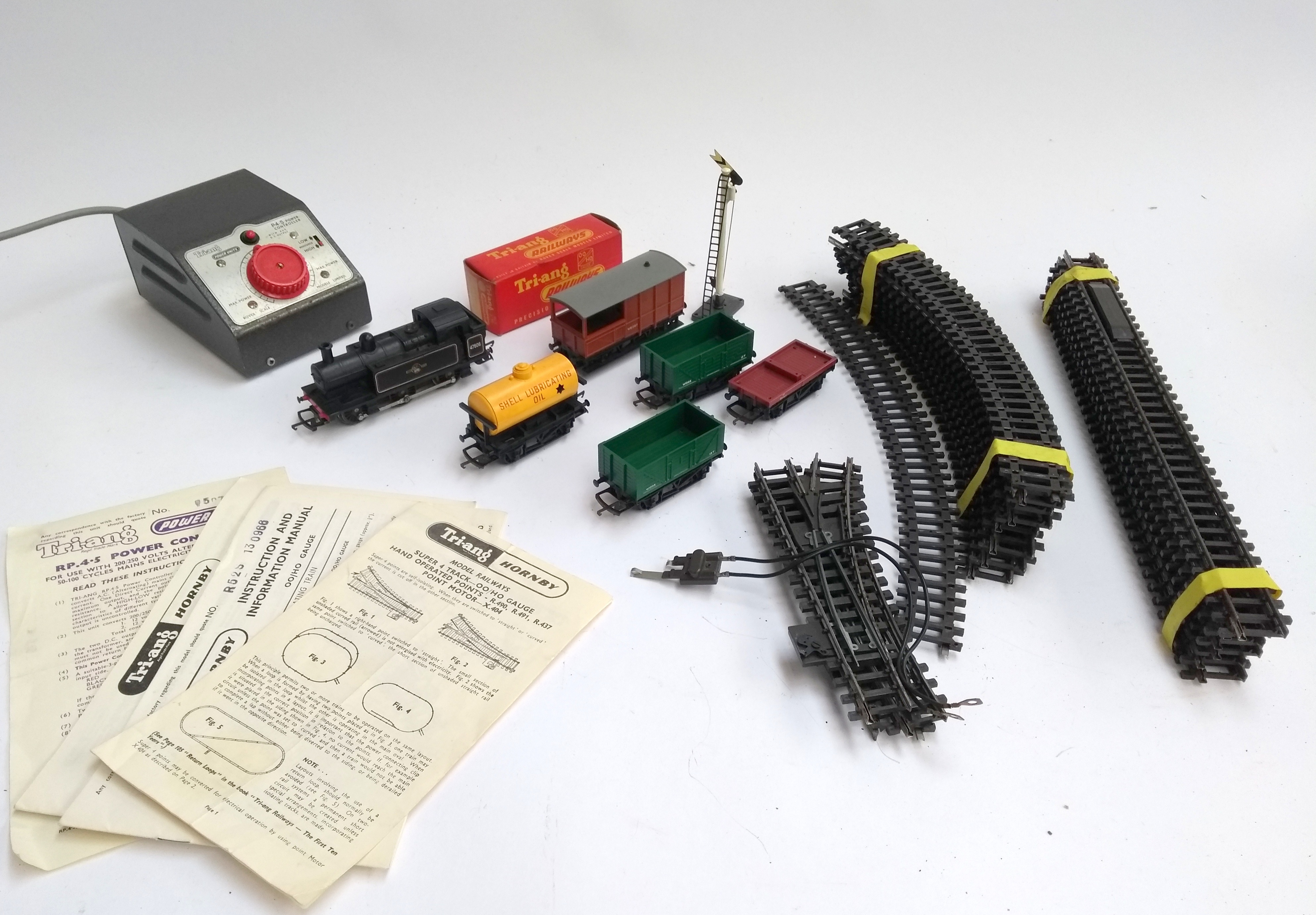 A small quantity of Triang, to include a Jinty 47606 loco, track, P4.5 power controller, manuals etc