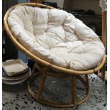 A vintage mid-century bamboo papasan chair with cream cushion, 115cmW