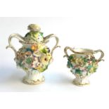 Two Coalbrookdale style floral encrusted twin handled urns, the tallest 16cmH