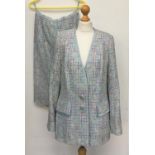 A David Pallat two piece ladies suit with trim; together with a Jaeger S/M silk top; and Jaeger