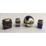 A set of four Limoges peint main porcelain pill boxes, with blue and gilt circle design, marked to