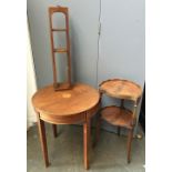 A small circular mahogany occasional table, with marquetry detail, on square tapered legs,