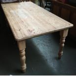 A modern pine farmhouse table, on baluster turned legs, 183x91x77cmH