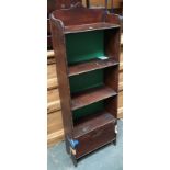 A narrow stained pine bookshelf, of five shelves, 49x24x140cmH