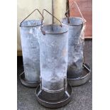 Three galvanised metal poultry feeders, marked Eltex, approx. 60cmH