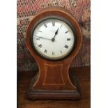 A mahogany mantel clock, by Wernet of Newport, Roman Numerals on white enamel dial, 21cmH