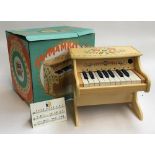 An Animambo Djeco electronic piano with box