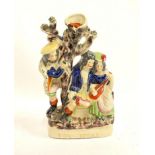 A Staffordshire flatback figural vase, 'The Rival', 30cmH