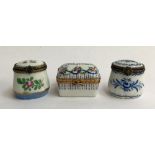 A set of three Limoges peint main trinket boxes, blue floral designs, two with motifs on lid, marked