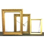 Three giltwood frames, the smallest 42x31, one with wheat sheath molding, 43x53cm, the largest