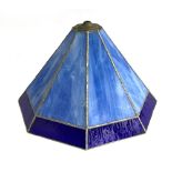 An Art Deco style stained glass lamp shade