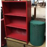 A small red painted bookshelf of three shelves, 60x92cmH; together with a green painted Lloyd Loom