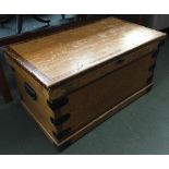 A vintage pine blanket box with metal bracings and loop handles, 83x46x44cm