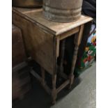 A small oak and plywood gateleg table, 60cmW