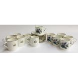 A Royal Worcester set of 12 coffee cans and 11 saucers, decorated with floral images and