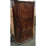 A 20th century oak wardrobe, with canted corners, 94x39x176cmH