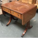 A 19th century mahogany sofa table, crossbanded top over two drawers, with swept supports and