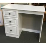 A contemporary kneehole desk, three drawers in white, 93x40x80cm; together with similar dressing