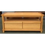 A contemporary oak side table, with undershelf and two drawers, 128cmW