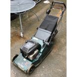 A Hayter lawnmower, with Harrier 48 petrol engine