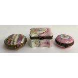 A set of three Limoges peint main trinket boxes, purple and pink floral designs, marked to base