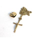 9ct gold chain with yellow metal crucifix, gross weight 3.8g plus a small 9ct gold heart locket 0.9g