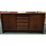 A Skovby Danish sideboard, with five central drawers flanked by sliding cupboards, 160x51x81cmH